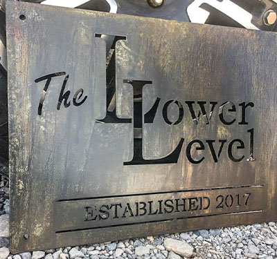 Blackened Steel Lower Level Business Sign