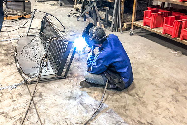 Welding On Arms To Parent memorial benches